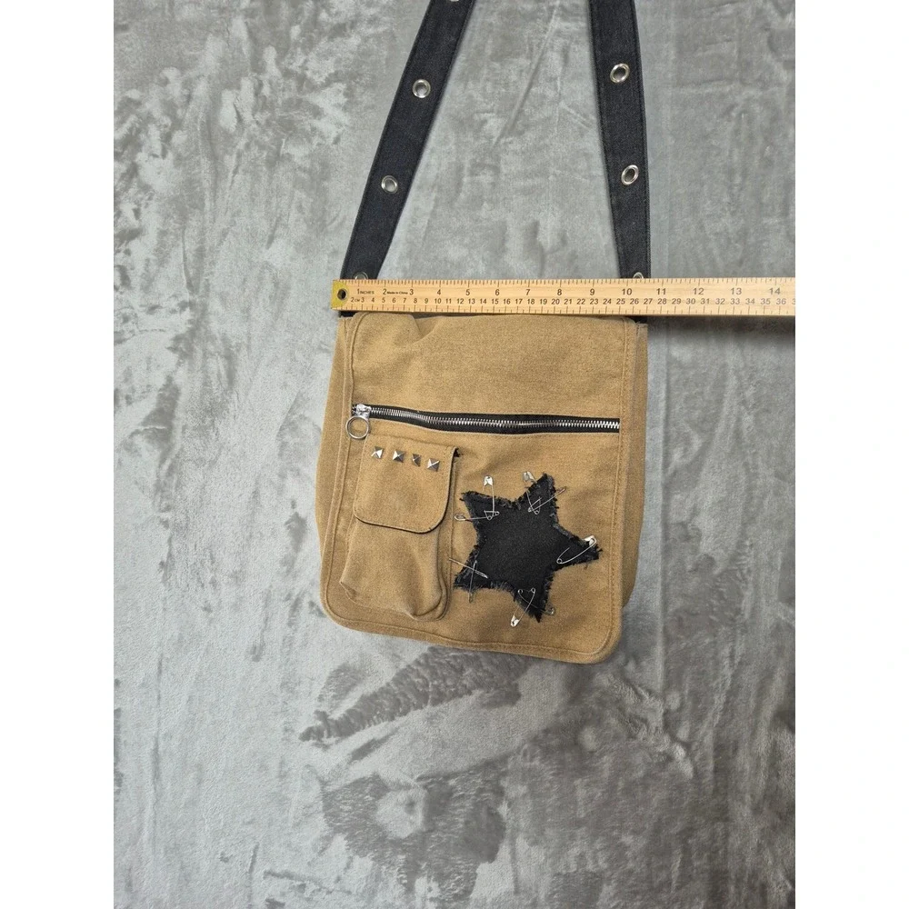 Hot Topic Tan Canvas Messenger Bag Black Star Safety Pin Studded Grommet Strap